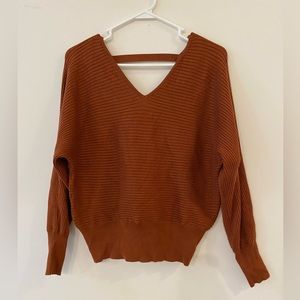 Small rust colored sweater